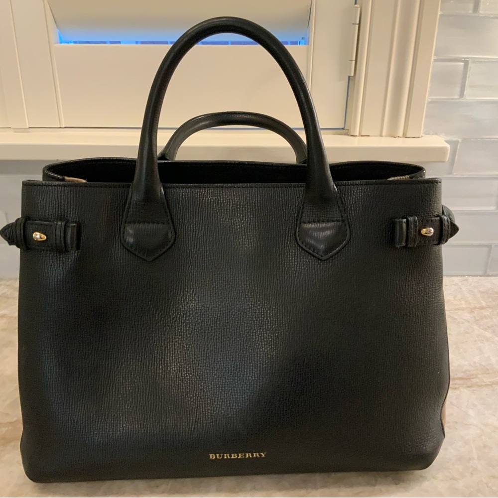 Burberry Black leather top handle bag.